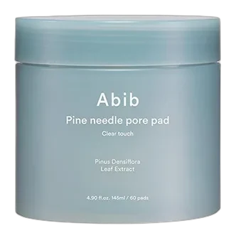 Abib Pine Needle Pore Pad Clear Touch jar with green label and embossed cotton pads