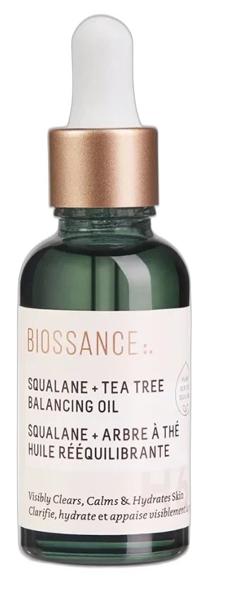 Biossance Squalane + Tea Tree Balancing Oil in a frosted glass dropper bottle