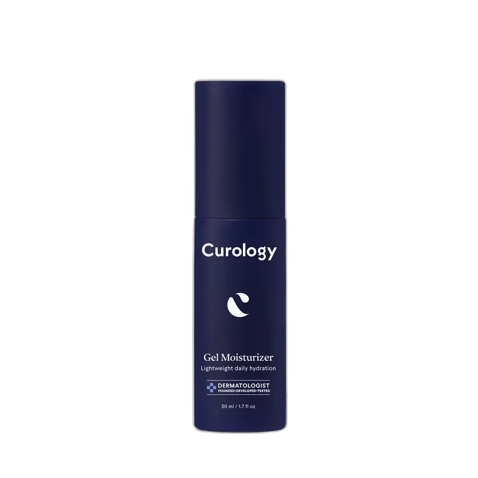 Curology The Moisturizer gel in navy blue airless pump bottle with minimalist white branding