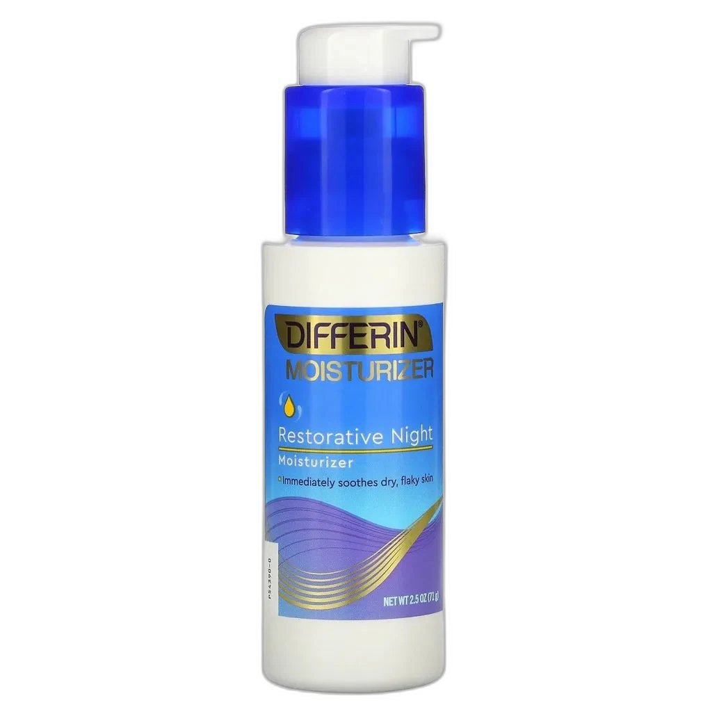 Differin Restorative Night Moisturizer in a white pump bottle with blue and purple Differin branding