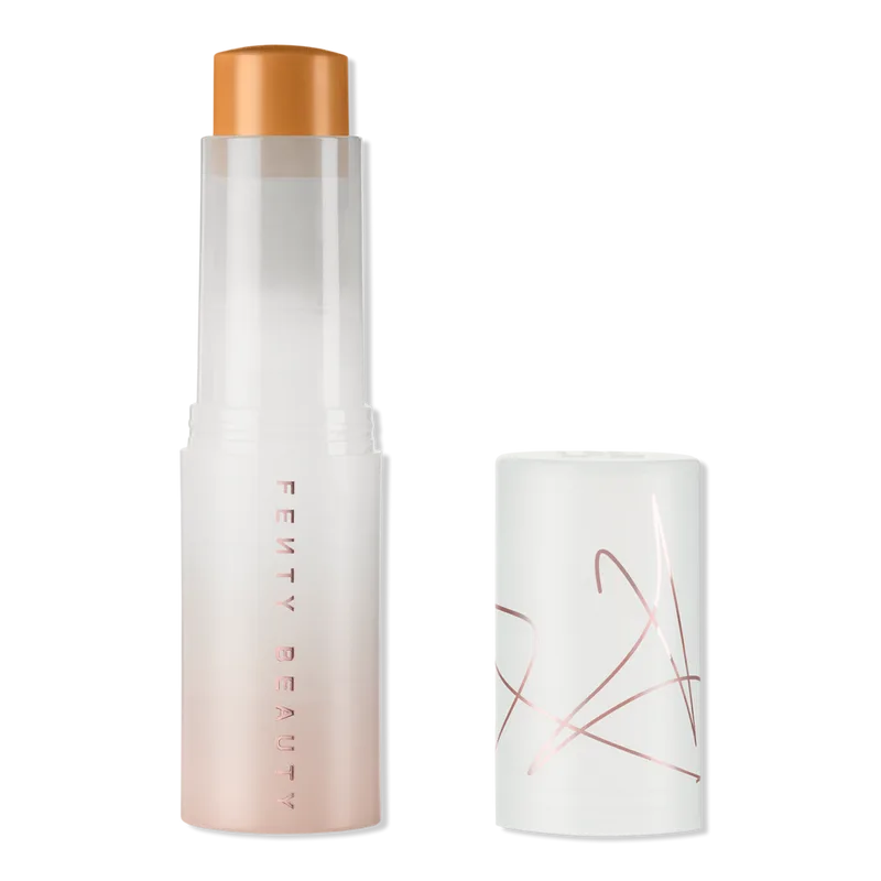 Dior Capture Totale Le Sérum glass bottle with gold pipette dropper and peach-tinted serum
