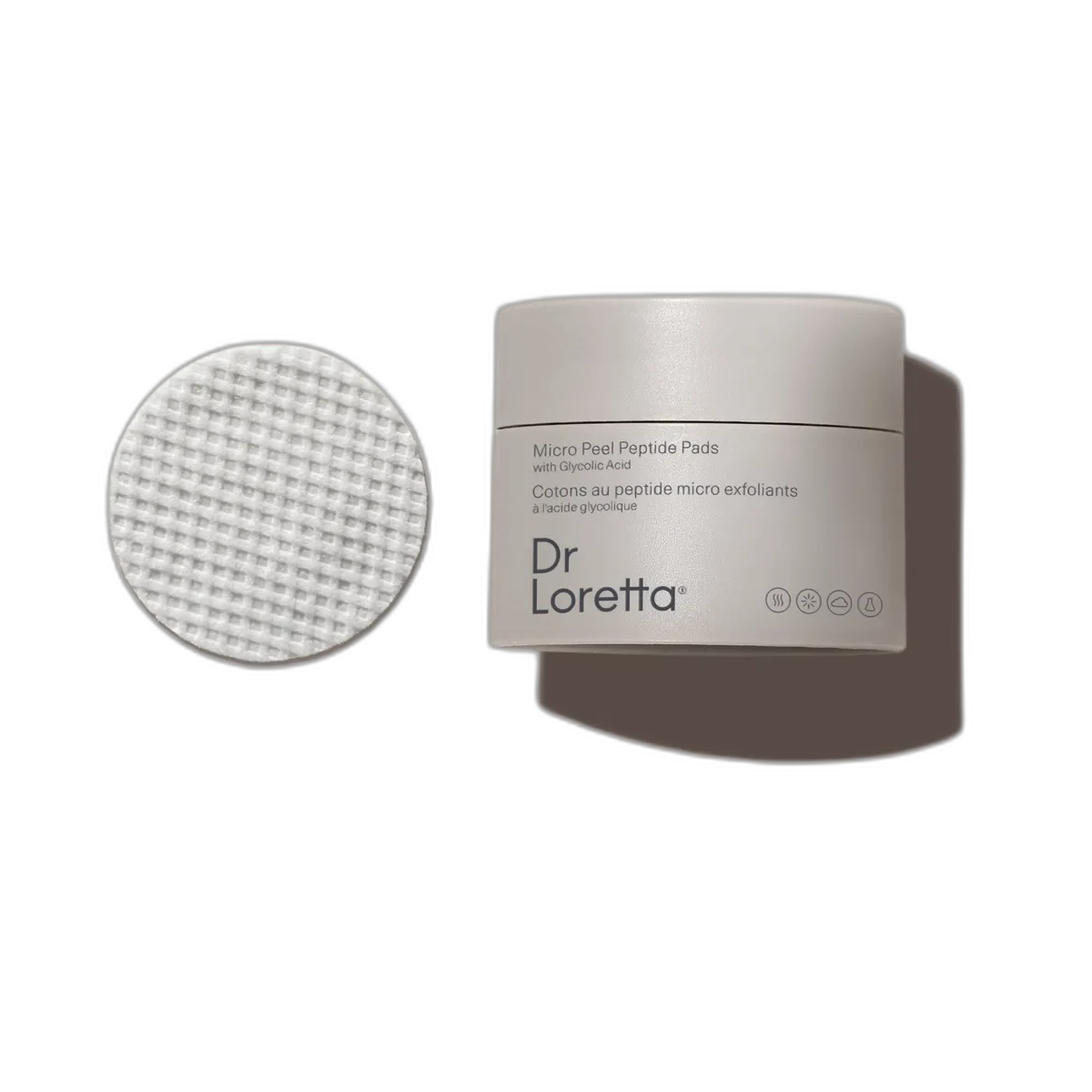 Frosted glass jar of Dr. Loretta Micro-Peel Peptide Pads containing 50 pre-soaked exfoliating pads