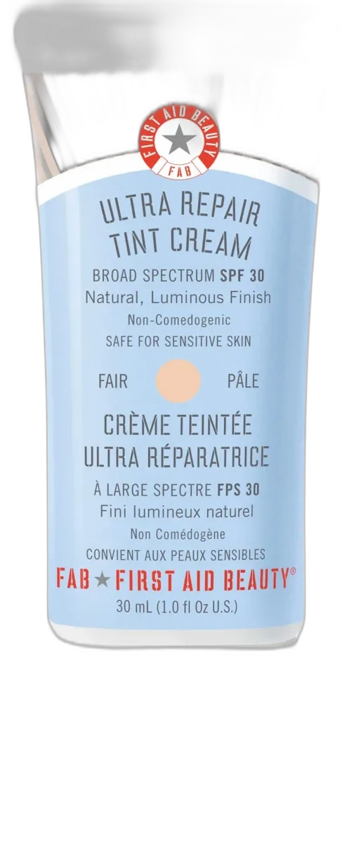 First Aid Beauty Ultra Repair Tinted Moisturizer SPF 30 in white tube with red accents