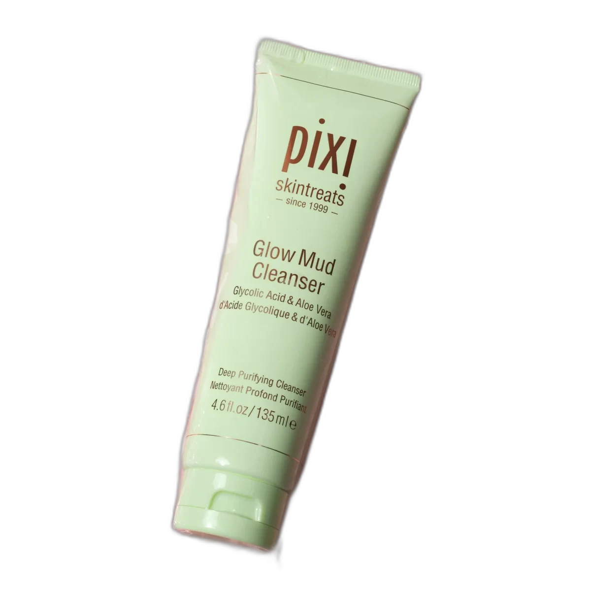 Pixi Glow Mud Cleanser green tube with exfoliating glycolic acid face wash